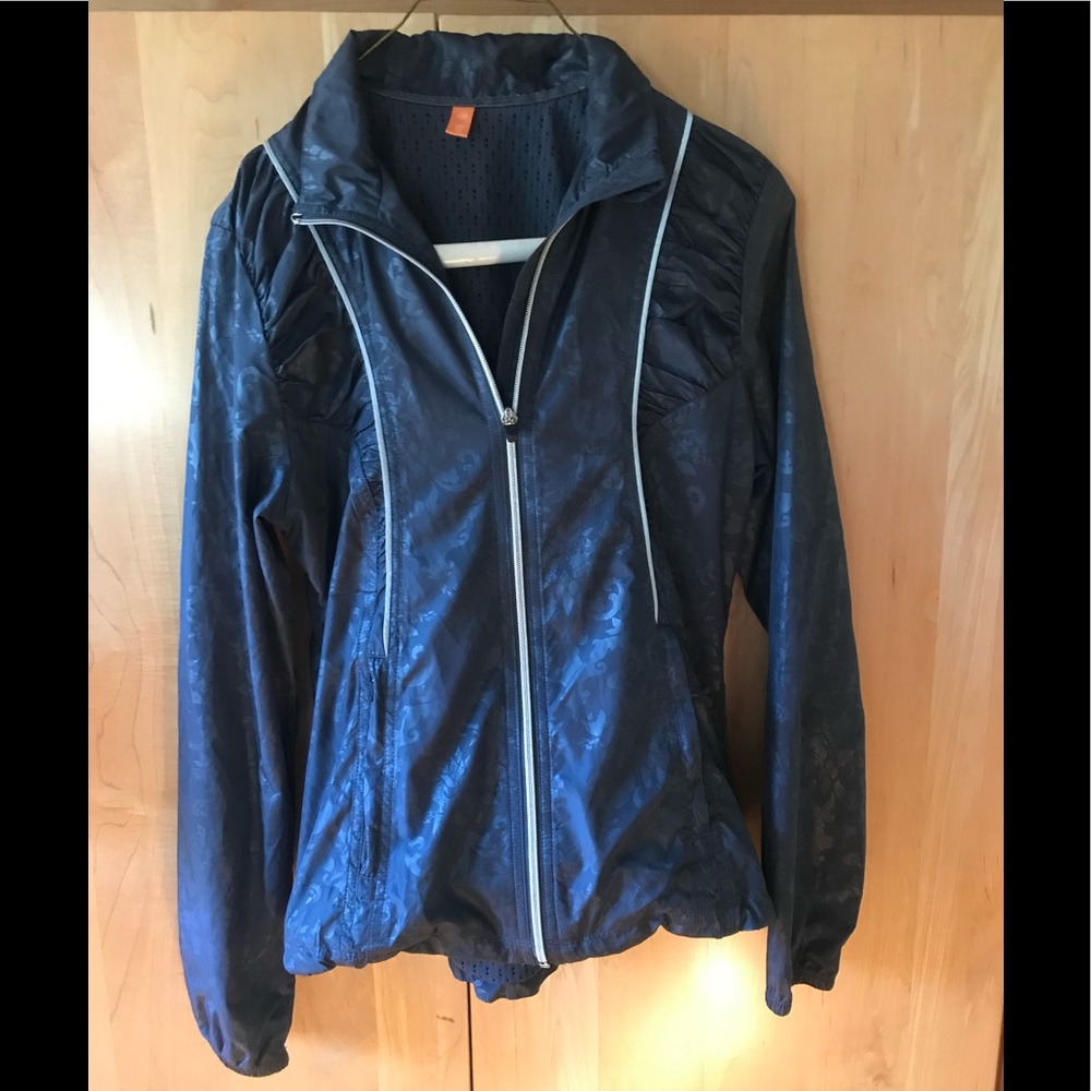Lucy brand woman’s sz xs blue jacket. Full zip. No tags. Perfect condition.
